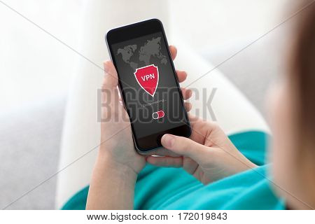 woman holding phone with app vpn creation Internet protocols for protection private network