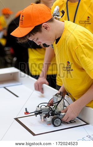Tyumen Russia - February 16. 2017: Open championship of professional skill among youth. World skills Russia Tyumen - 2017. Competitions of robots among school students