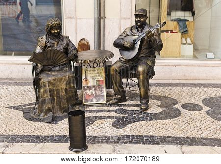 LISBON, PORTUGAL - September 26, 2016: Living statues impersonating Fado the Portuguese national song in downtown Lisbon Portugal