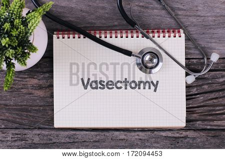 Vasectomy Word On Notebook,stethoscope And Green Plant.