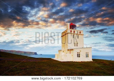 Beautiful white lighthouse at Cape Dyrholaey, South Iceland.