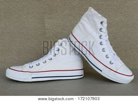 close up vintage style of sport white sneaker shoe on white background