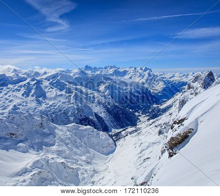 Alps in winter, view from Mt. Titlis. The Titlis is a mountain in Switzerland, located on the border between Swiss cantons of Obwalden and Bern.