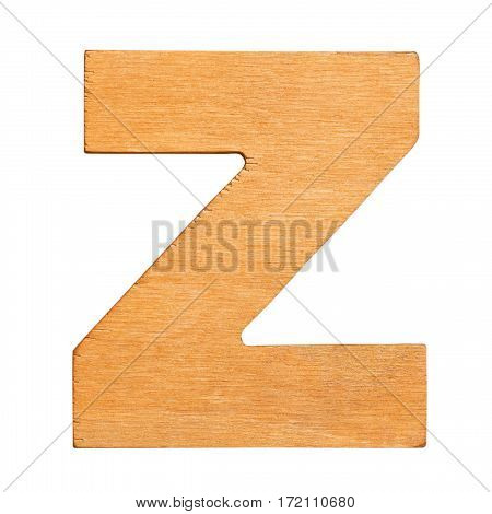 Old wooden letter Z on wooden background. One of full alphabet wooden set