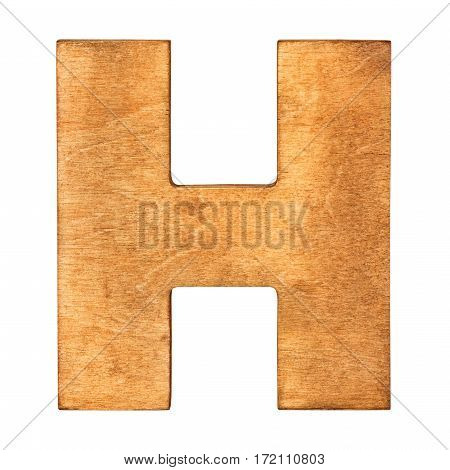 Old wooden letter H on wooden background. One of full alphabet wooden set