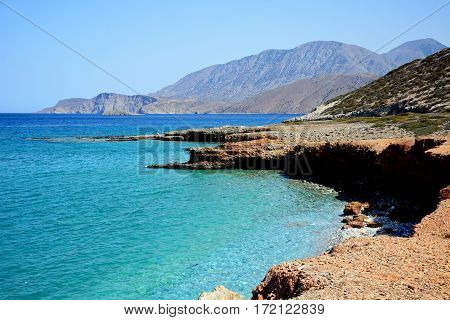 View of the beach and rugged coastline near Ammoudara Crete Greece Europe.