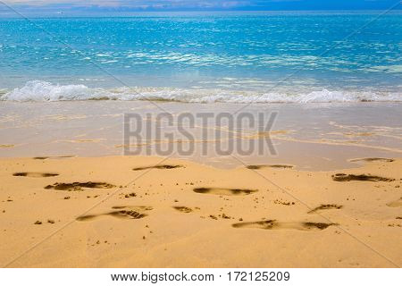 close up Footmark in the Sand on Beach at Thailand
