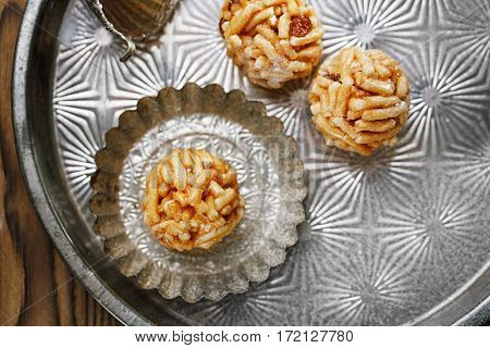Chak-chak traditional asian sweet dessert - fried dough with honey