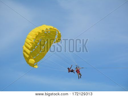 People Playing Parasailing In Phuket, Thailand