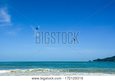People Playing Parasailing In Phuket, Thailand