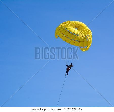 People Playing Parasailing In Phuket, Thailand