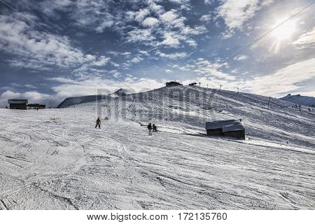 Empty ski domain located at high altitude in Alps in Beaufortain Massif in Haute-Savoie close to Mont Blanc. In the distance can be seen Mont Joly peak at 2525 m .