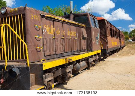 Manaca Iznaga Cuba - January 29 2017: Tourist train in the Valley of the Sugar Mills or Valle de los Ingenios a Unesco World Heritage site and a major tourist landmark in Cuba