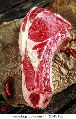 Fresh Raw Beef bone rib roughly choppid on on baking paper