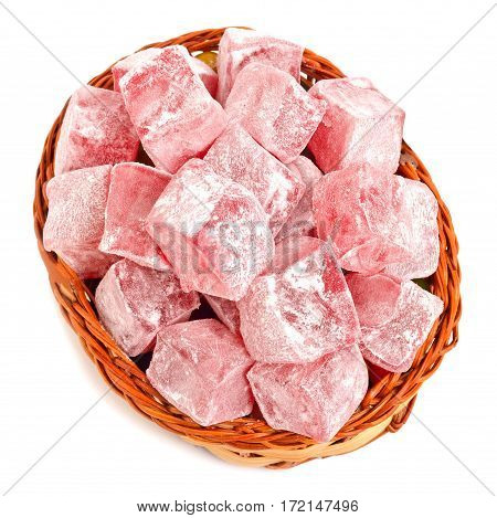 Turkish sweet delights in basket isolated on white
