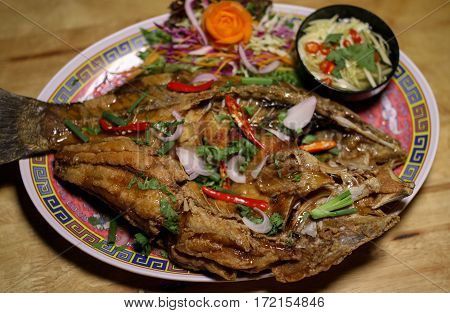 Thai Fired Snapper with hot and spicy Chili Sauce.