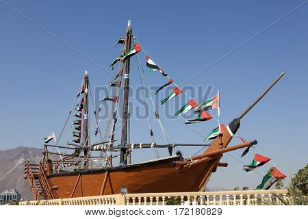 Historic dhow ship at the corniche in Khorfakkan United Arab Emirates