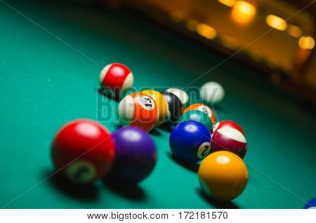 Billiard balls in a pool table. game