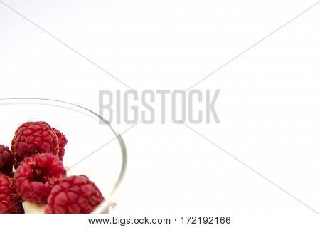 raspberry witth sauer cream in isolated white background