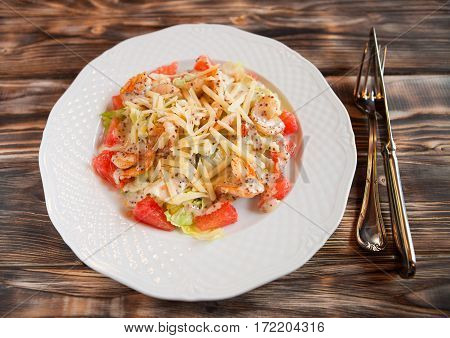 Tasty Shrimps And Grapefruit Salad Decorated With Cheese