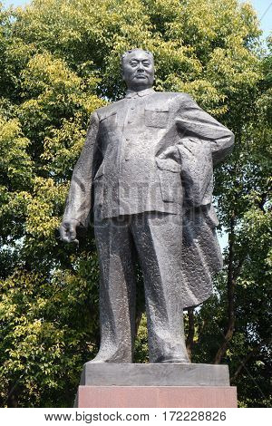SHANGHAI - FEBRUARY 29. Statue of Chen Yi, first mayor of Shanghai on the Bund in Shanghai. This 5.6m high bronze sculpture was erected at 1993 in Shanghai, China, February 29, 2016.