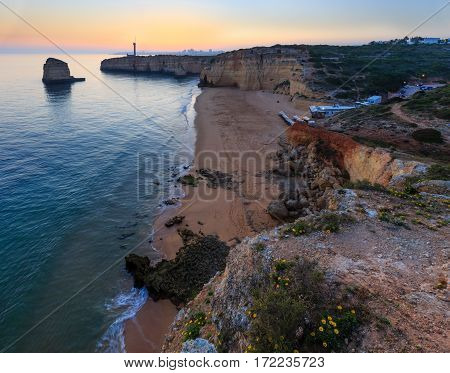 Sea Coast Sunset Landscape And Lighthouse.