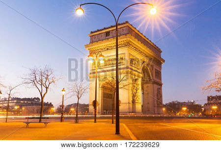 The Triumphal Arch in evening Paris France.