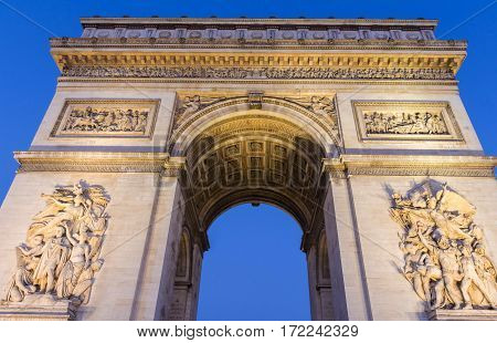 The Triumphal Arch in evening Paris France.