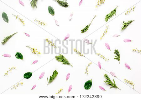 Bright froral pattern with fresh petals on white table background top view mockup