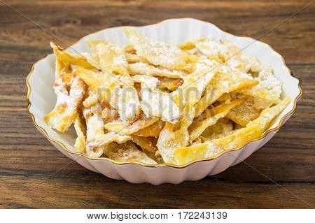 Homemade brushwood-crunchy cookies on plate. Studio Photo