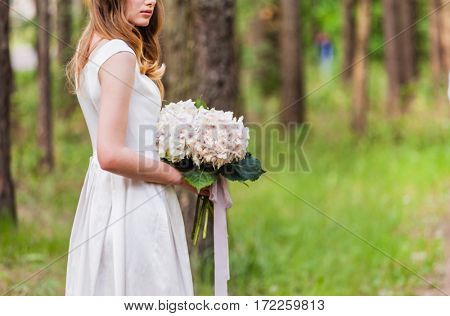 Beautiful bride with flowers
