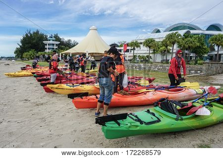 Labuan,Malaysia-Feb 19,2017:Group of adventurer ready to kayaking in Labuan island,Malaysia.Malaysia is the ideal place for water sports,like white water rafting,kayaking,scuba diving,sailing,banana boating,jet skiing,wakeboarding or parasailing, Malaysia