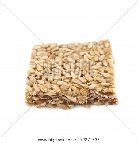 Single piece of a gozinaki confection sweets isolated over the white background