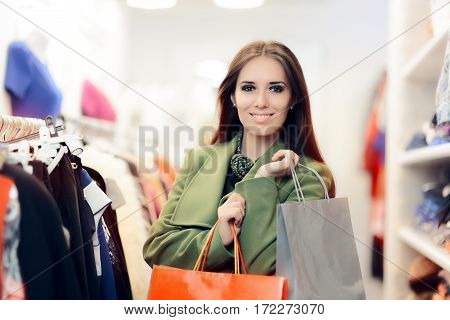 Elegant Shopping Woman Wearing a Green Coat in Fashion Store