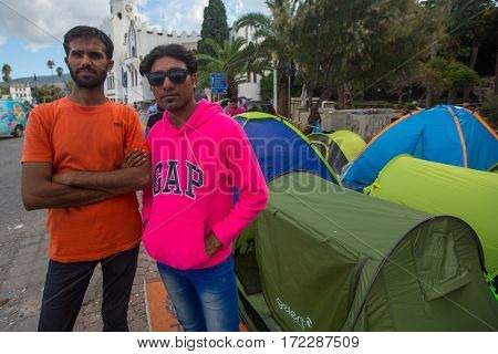 KOS ISLAND, GREECE - SEP 27, 2015: Unknown refugees arriving in Greece by inflatable boats from Turkey. Kos island is located just 4 kilometers from the Turkish coasts.