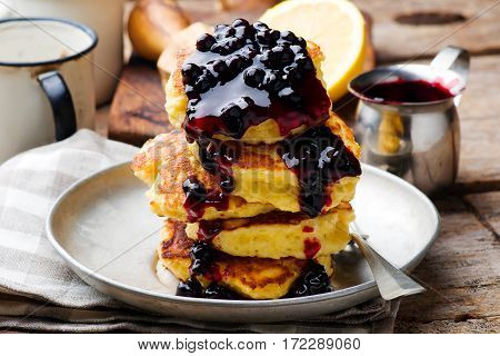 LEMON RICOTTA PANCAKES WITH BLUEBERRY SAUCE..selective focus