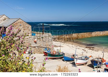 Small fishing boats in the harbour at Sennen Cove Cornwall England UK Europe