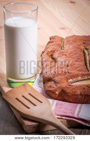 healthy oatmeal home made banana bread and milk for breakfast