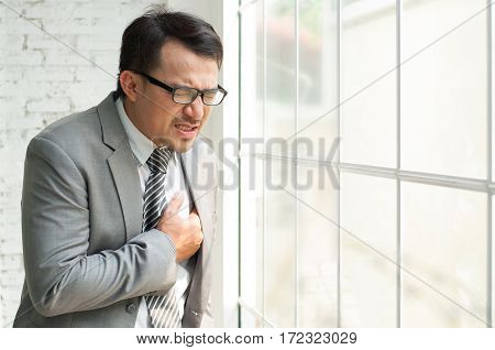 Businessman be ill and heart failure when he work hards always at his offiice.