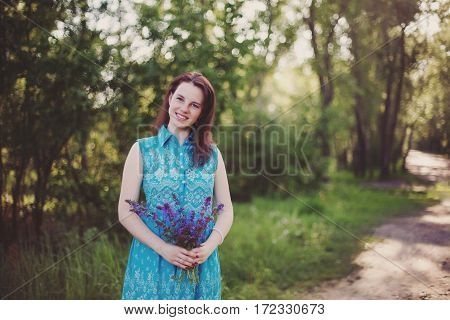 Young happy loving couple having fun and enjoying in park