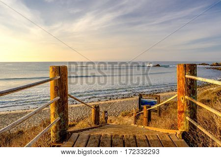 USA Pacific coast landscape, boardwalk to Leo Carrillo State Beach, Malibu, California.
