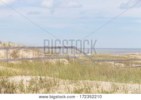 Wood Fence On The Dunes At Lagoa Do Peixe National Park