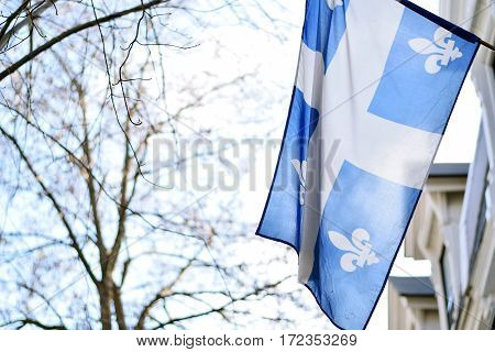 Quebec Flag In Montreal Billowing In The Breeze