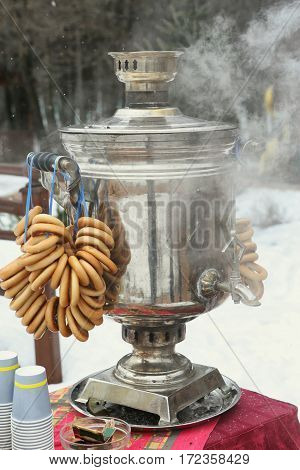Russina Samovar With Bagels On Winter Background