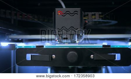 Three dimensional printing machine. 3D printer during work
