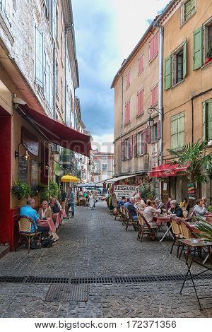 Les Vans, France, September 17, 2015: Image of restaurants in a streets in the center of Les Vans in the Ardeche region of France