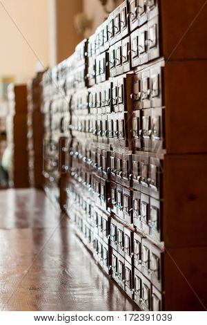 Old wooden cabinets with documents in the library