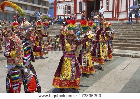 ARICA, ARICA and PARINACOTA, CHILE - FEBRUARY 10, 2017: Men and women of the group Thinkus Rupay Masis, performing at the annual street carnival celebrating the strength of the sun.