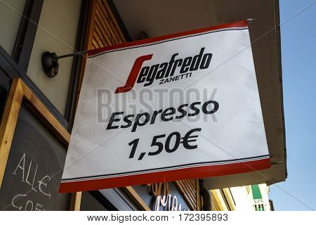 MUNICH, GERMANY - AUGUST 02, 2015: Sign of the coffee chain Segafredo at a building on Ludwigstraße that points out the price of an espresso