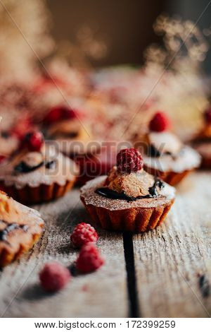 Delicious Chocolate Cupcakes With Berries On Wodeen Table, Top V